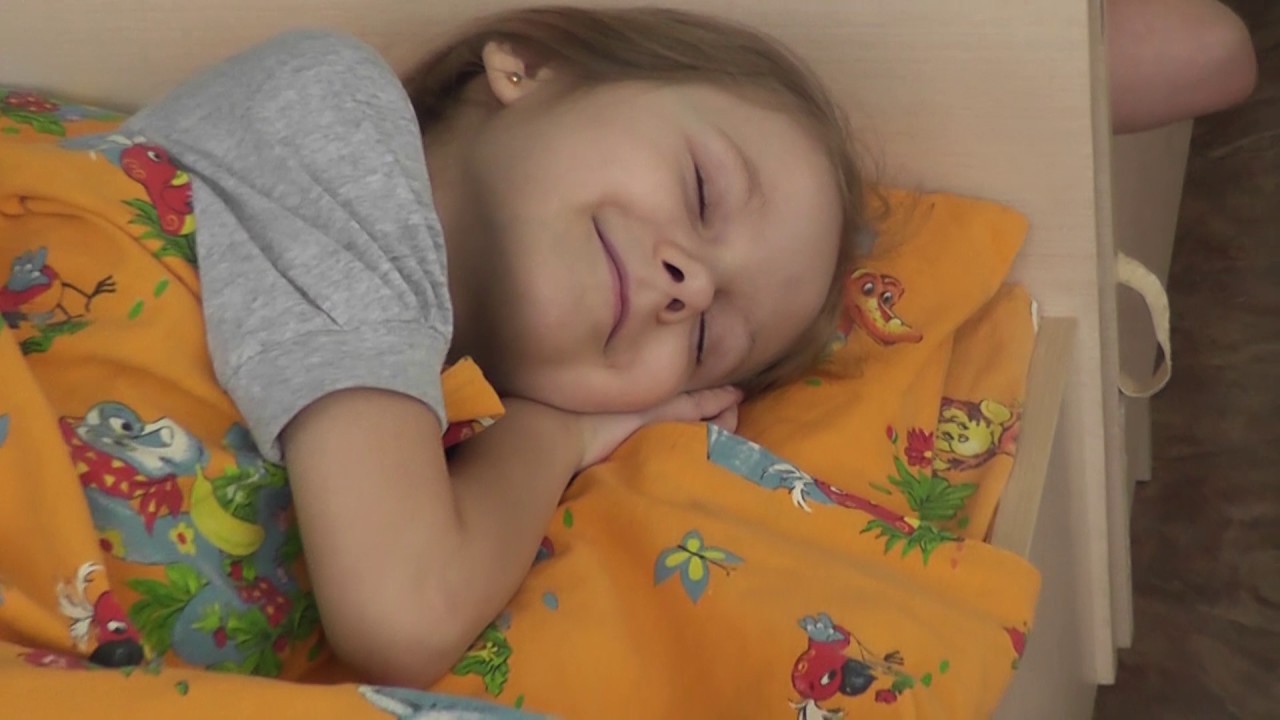 child sleep in kindergarten